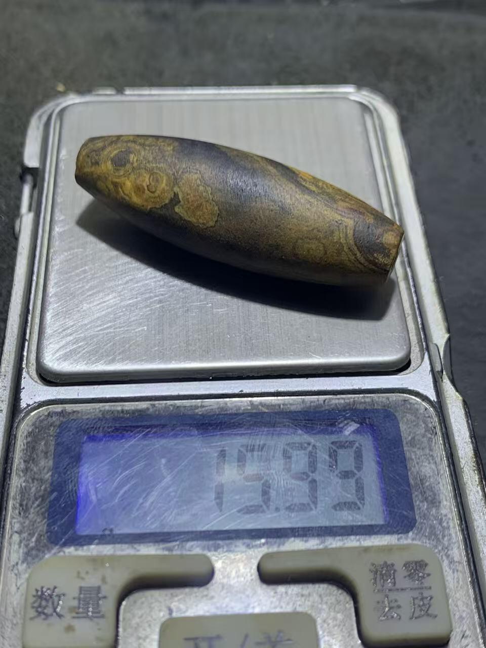 天然精美亚光九眼页岩8字天眼纹天珠一个