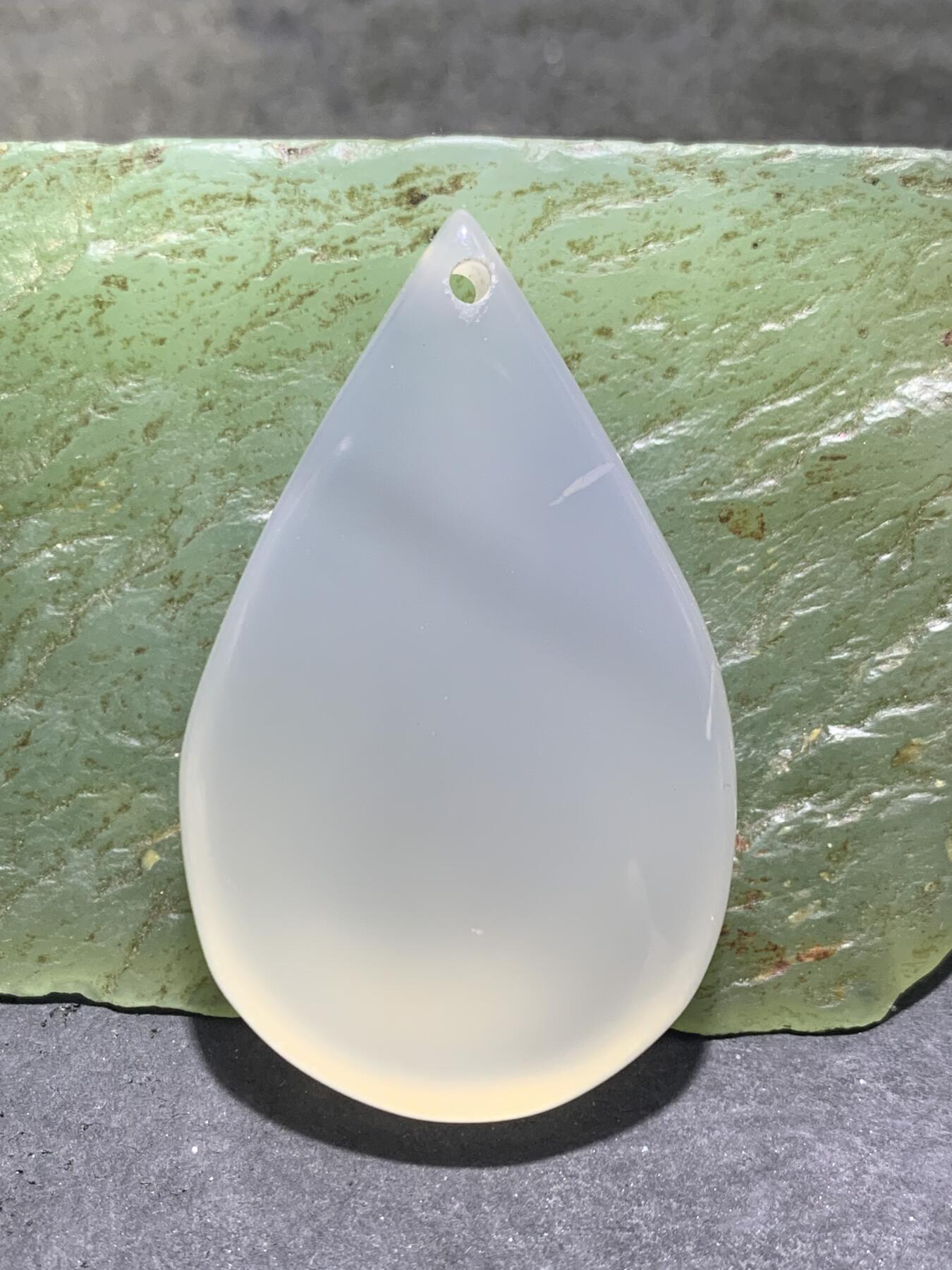 冰透高玉化海洋玉髓通货吊坠一个，