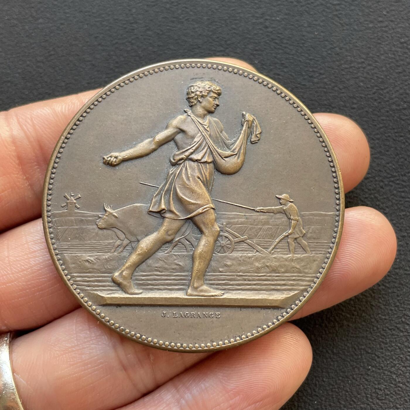 「木头集藏」章牌专场-第65场 1906年法国播种者农业铜奖章，直径：50.4 mm，65.5 g，边铭：丰饶角 BRONZE，品相不错。