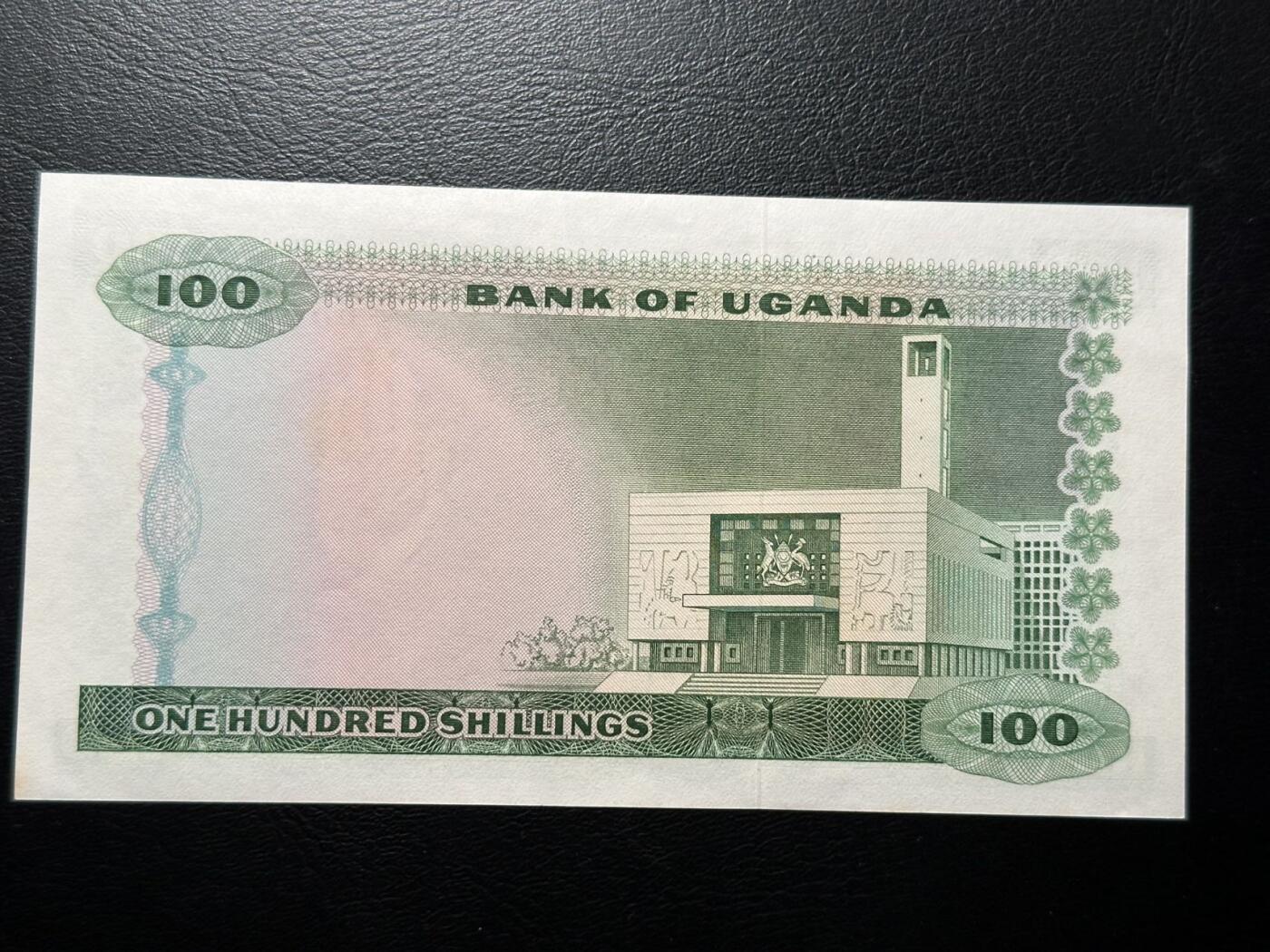 九十九场（喜迎元旦） 乌干达1966年100先令，品种不错，品相unc，有黄