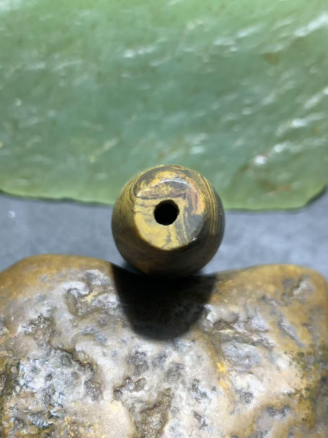 天然精美亚光九眼页岩8字天眼纹天珠一个