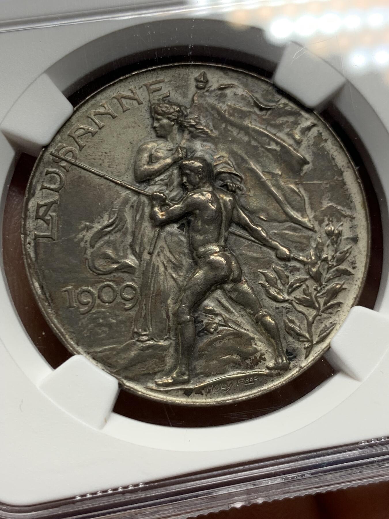 《竞宝斋》第453场 周日，周一 2场连拍 （全场包邮，欢迎送拍） NGC MS62 瑞士洛桑  1909年 城市景观铜章 超燃造型 银章极少见