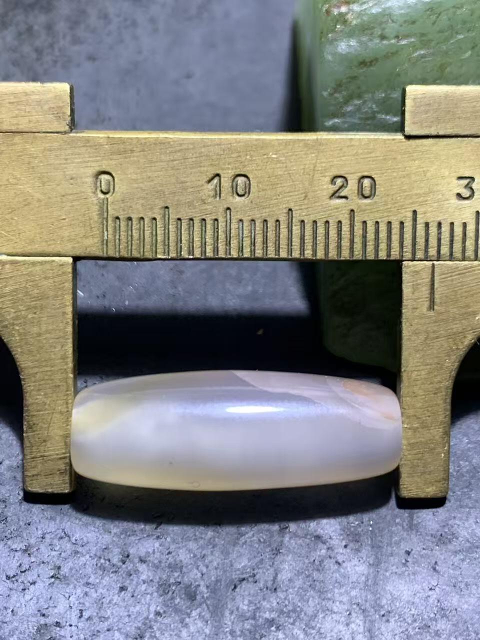 高玉化冻料巴西玛瑙通货桶珠一颗，，