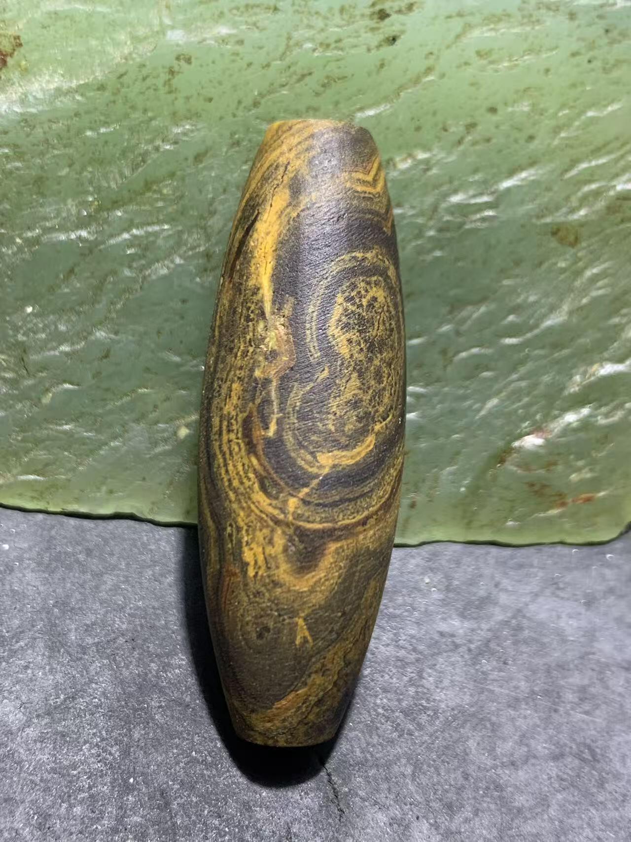 天然精美亚光九眼页岩8字天眼纹天珠一个