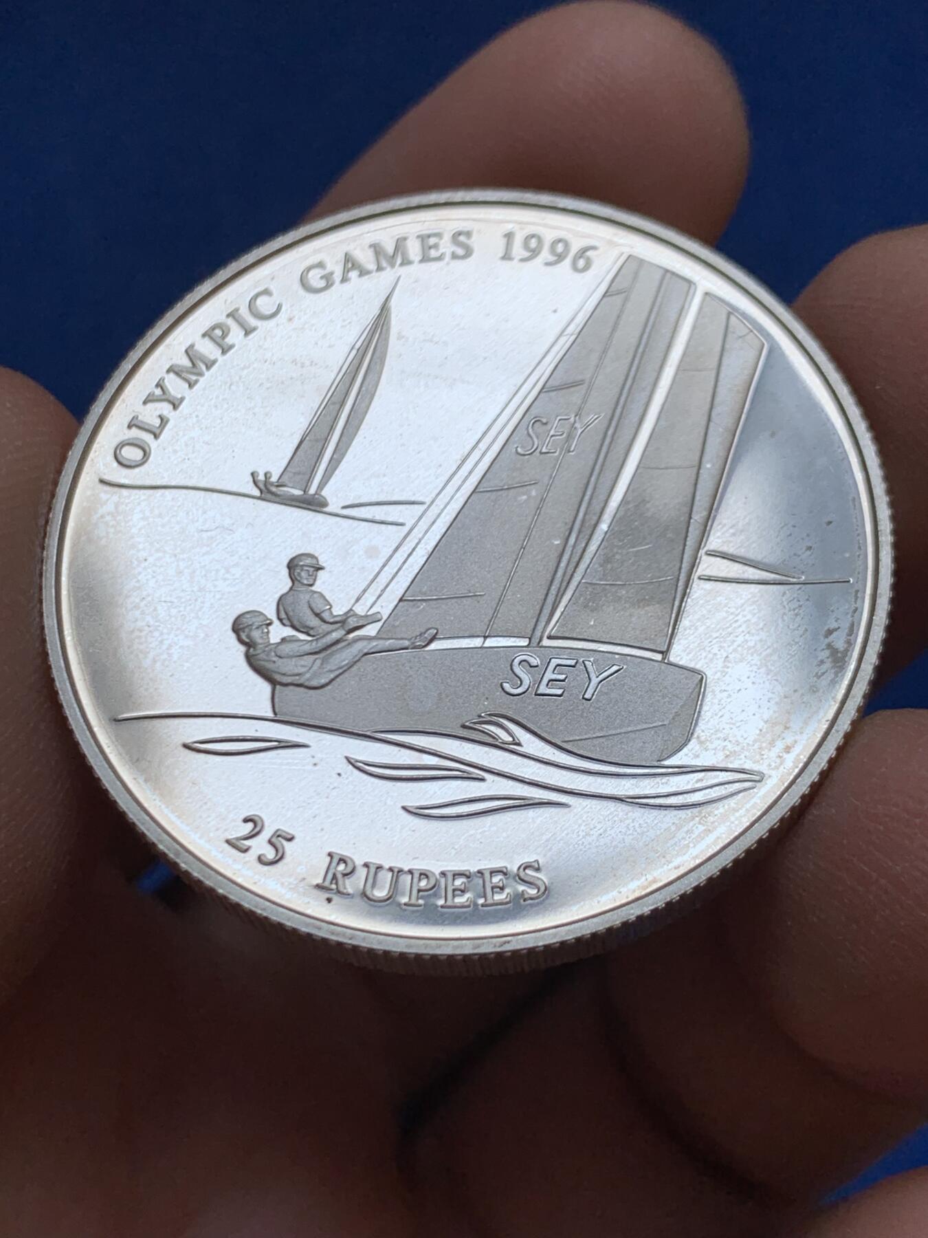 《竞宝斋》第453场 周日，周一 2场连拍 （全场包邮，欢迎送拍） 塞舌尔1995年纪念1996年奥运会25卢比银币 925银 31.3克