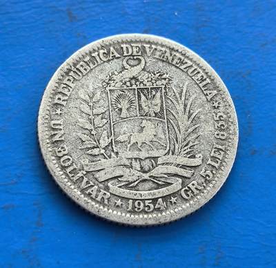 外国优质老铜币高银银币，周六九点倒数截拍，满百包邮，持续收拍 - 委内瑞拉1954 年银币，正面刻拉美独立英雄玻利瓦尔，背面饰国徽（含骏马等元素），银质包浆蕴岁月痕迹。承载南美解放史记忆，融英雄符号与国家象征，因地域小众存世独特，是解码拉美独立脉络、收藏异域币艺的珍贵标本 。