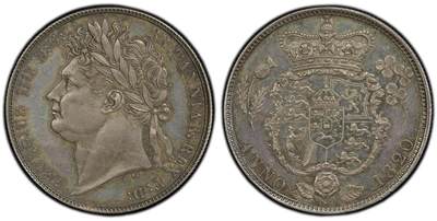 万国钱币拍卖第058期（万国新年大拍） PCGS PR64 1820英国乔治四世三花精制半克朗 极其罕见的精制版本 一颗精雕细琢的艺术品 象征英格兰的玫瑰，苏格兰的蓟草和爱尔兰的三叶草三位一体的围绕在汉诺威王朝的盾徽周围 将乔治四世时期的装饰艺术体现的淋漓尽致 在精制工艺的加持下更显华丽 双面英式乌云五彩镜面底板 顶级典藏品质