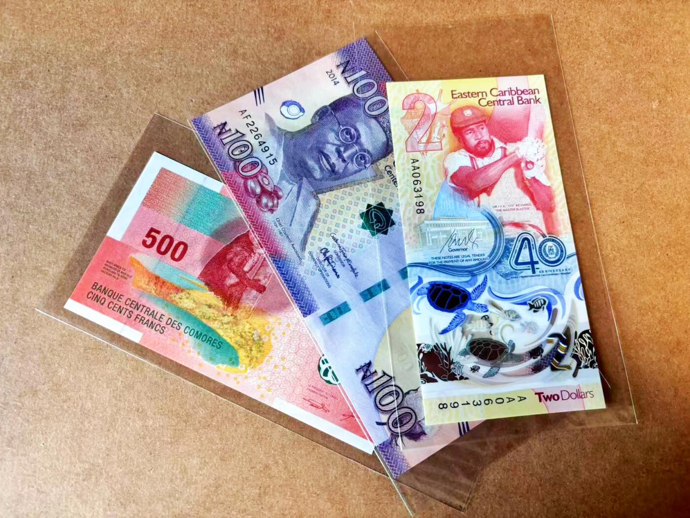 【Blue Auction】世界纸币精拍第770期——18级TOP拍卖/信誉/品质/专业/高效💫 【一组3张 含AA冠无47获奖钞】东加勒比、科摩罗、尼日利亚纸币一组 全新UNC