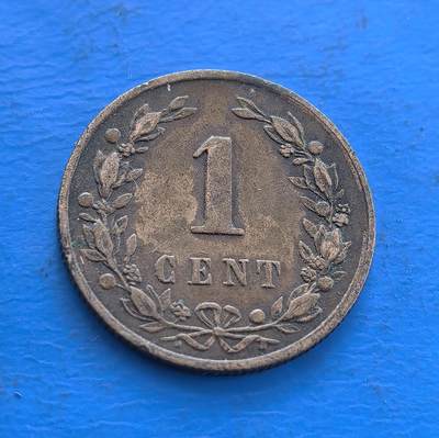 外国优质老铜币高银银币，周六九点倒数截拍，满百包邮，持续收拍 - 荷兰1878 年1 分铜币，铸于威廉三世统治期，见证王国近代历程。正面雄狮国徽（持剑握箭袋，凝武力与商贸符号），背面花环围 “1 CENT”，青铜包浆载百年痕迹。属殖民流通币标本，设计融王权元素，存世渐稀，是解码荷兰历史、欧币收藏入门的独特标的 。