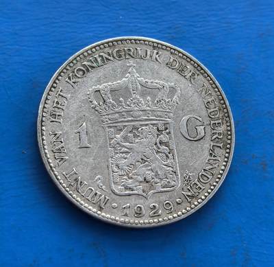 外国优质老铜币高银银币，周六九点倒数截拍，满百包邮，持续收拍 - 荷兰1929 年1 盾银币，正面威廉明娜女王像，背面王室纹章，银质包浆凝岁月。值大萧条前夜，见证两次大战间荷兰君主制脉络，铸工精湛。存世因流通渐稀，属王室币系标本，融历史符号与欧陆币艺，小众收藏解码异域王室与时代的独特标的 。