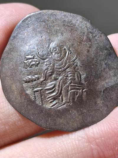 拜占庭帝国 公元1118-1143年 约翰二世 特拉奇碟形铜币，品相非常漂亮，银层尚全，打制清晰，重量达到4.3克。在拜占庭蝶形铜币中算很大的了