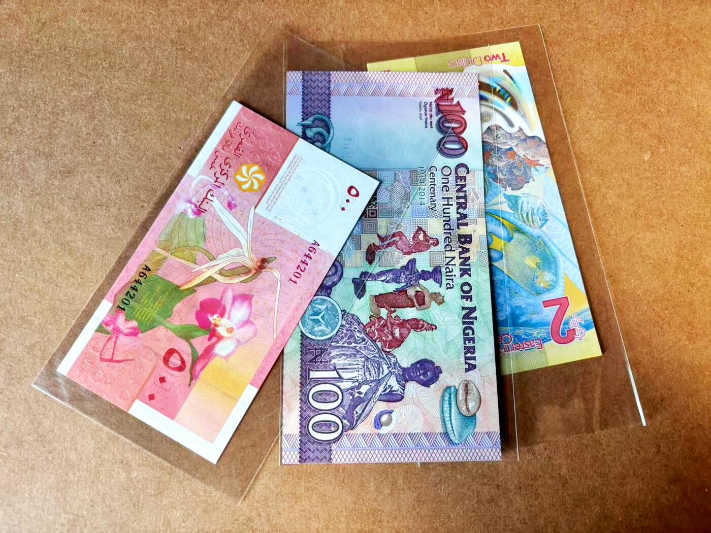 【Blue Auction】世界纸币精拍第770期——18级TOP拍卖/信誉/品质/专业/高效💫 【一组3张 含AA冠无47获奖钞】东加勒比、科摩罗、尼日利亚纸币一组 全新UNC