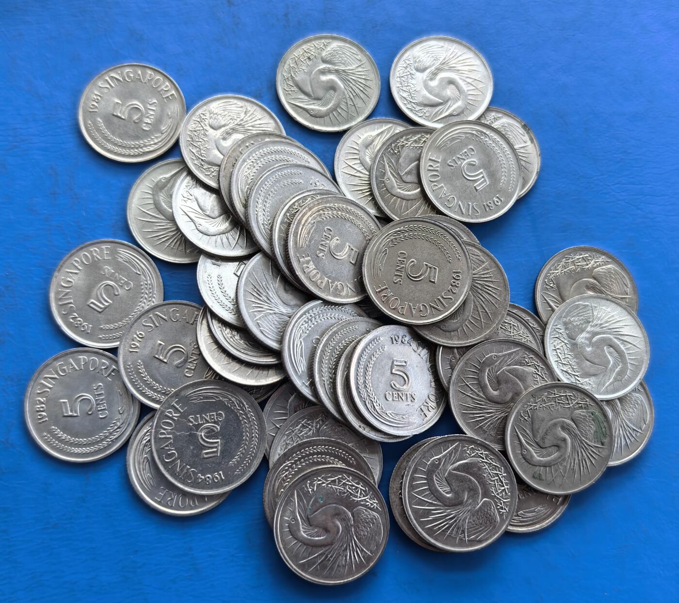 外国优质老铜币高银银币，周六九点倒数截拍，满百包邮，持续收拍 新加坡80年代5分50个，69克