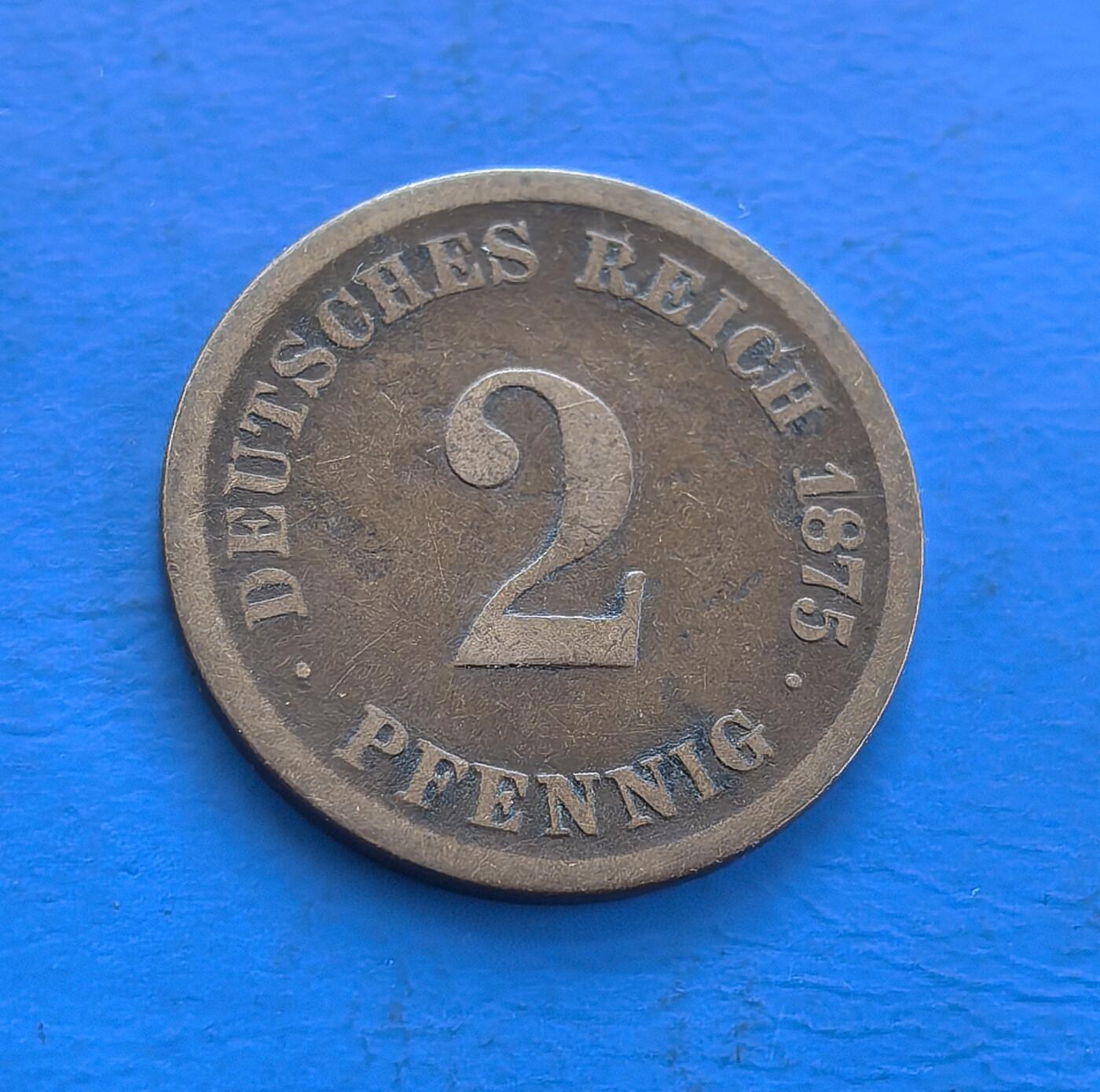 外国优质老铜币高银银币，周六九点倒数截拍，满百包邮，持续收拍 德意志帝国1875 年 2 芬尼铜币E版，诞生于德国统一后初创阶段。正面镌帝国名号与面值，背面帝国鹰徽凝萃统一权威，铜质包浆载百年痕迹。见证近代德国货币体系发端，属欧洲古典币标本，解码帝国崛起脉络，收藏兼具历史厚重与统一符号意趣 。