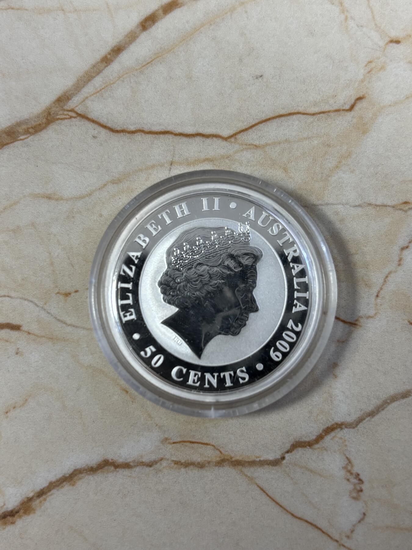 第186期拍卖 澳大利亚2009年世界投资银币考拉3树袋熊1/2盎司银币，999银，，银价280