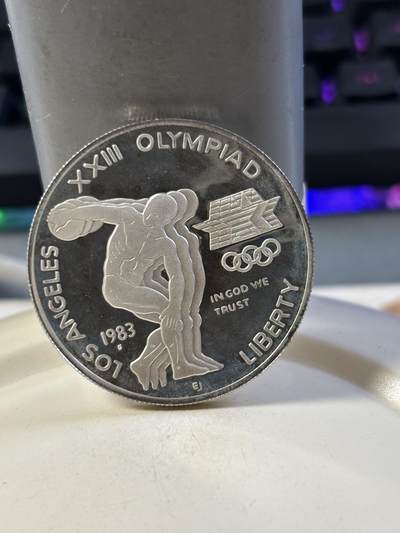 第186期拍卖 - 美国1983年洛杉矶奥运铁饼 精制银币，900银，26.73克银价433，没有塑料盒