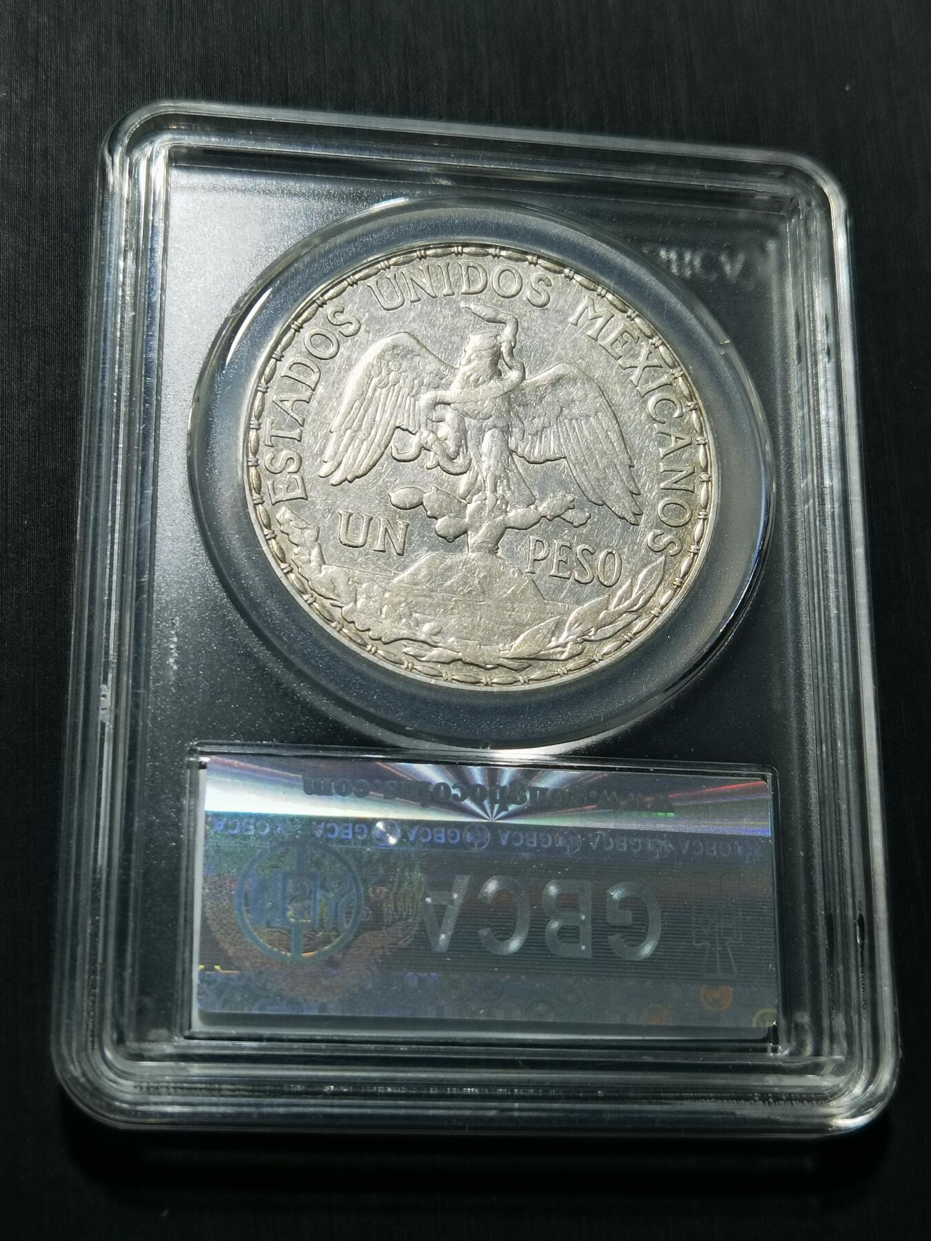 天下钱庄专场欢迎参拍 公博评级AU55墨西哥骑马鹰洋