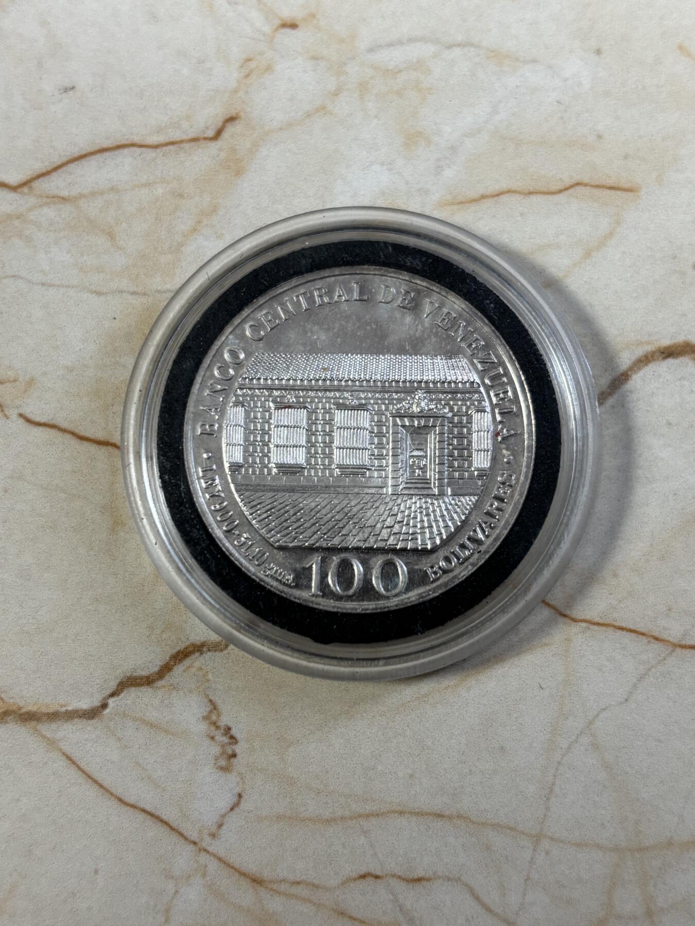 第186期拍卖 委瑞内拉1983年西蒙·玻利瓦尔诞辰200周年100玻利瓦尔1盎司纪念银币，900银，银价507