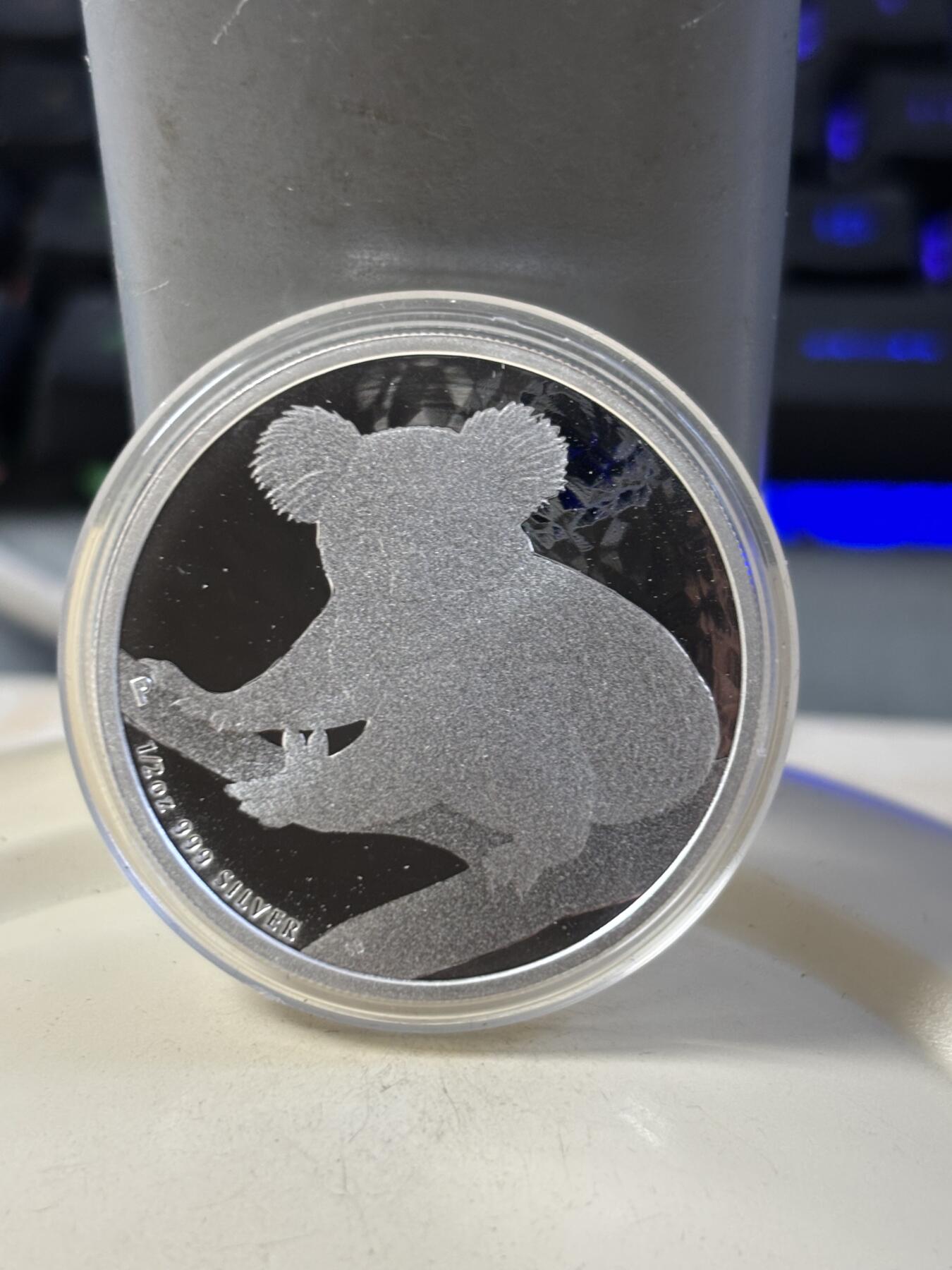 第186期拍卖 澳大利亚2009年世界投资银币考拉3树袋熊1/2盎司银币，999银，，银价280