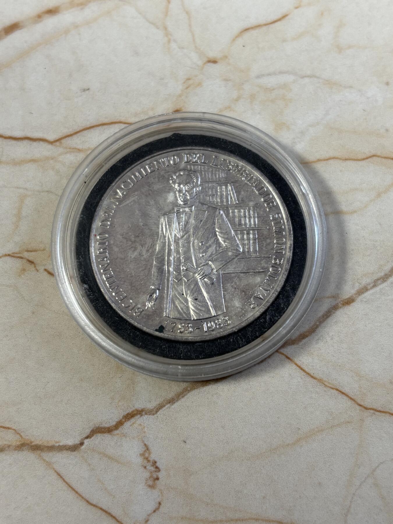 第186期拍卖 委瑞内拉1983年西蒙·玻利瓦尔诞辰200周年100玻利瓦尔1盎司纪念银币，900银，银价507