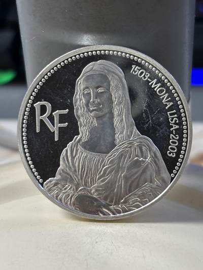 第186期拍卖 - 法国2003年蒙娜丽莎500周年纪念银币，900银，22.2克，有瑕疵，没有塑料盒，银价360