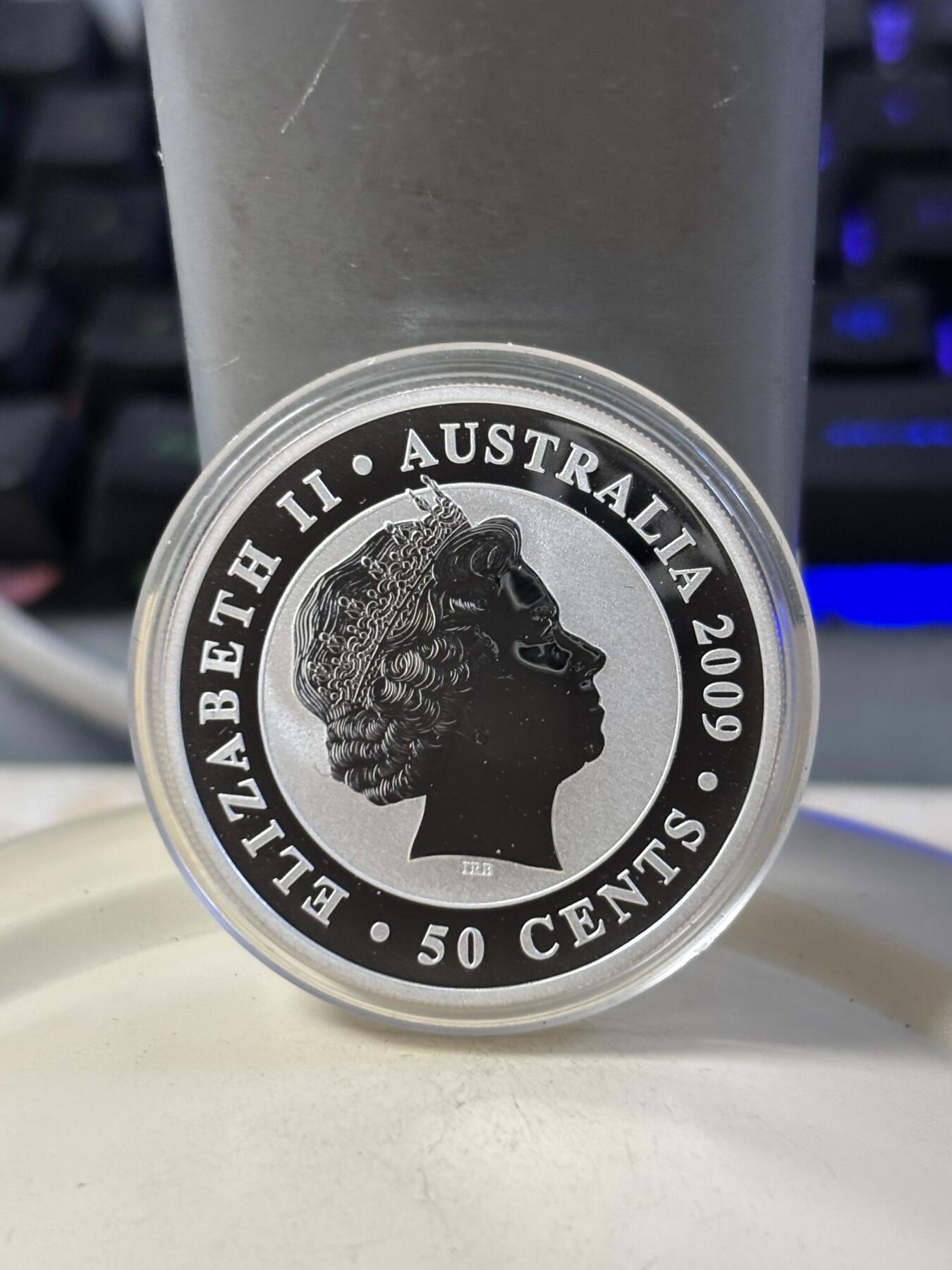 第186期拍卖 澳大利亚2009年世界投资银币考拉3树袋熊1/2盎司银币，999银，，银价280