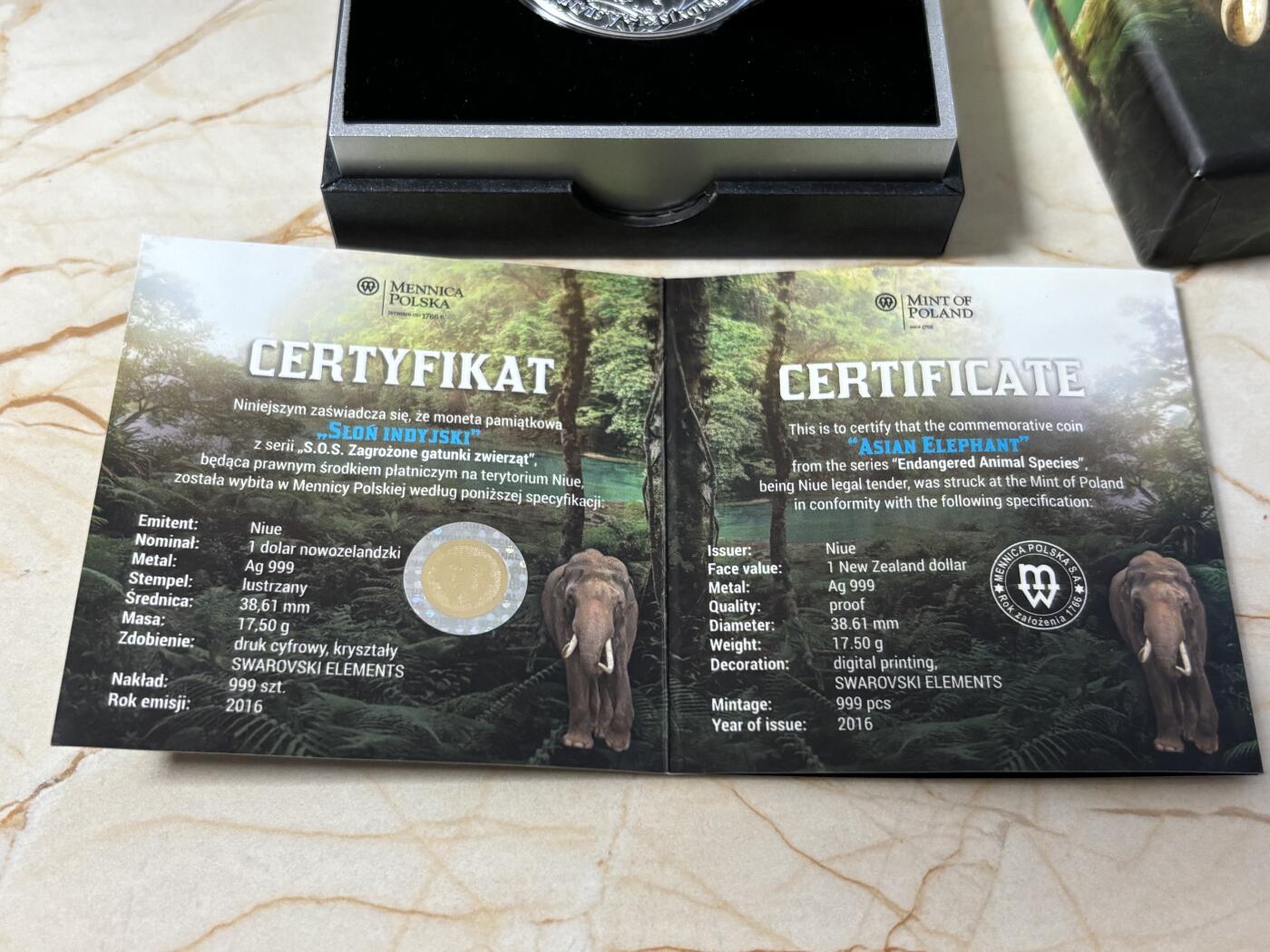 第186期拍卖 纽埃2016年濒危动物物种亚洲象镶嵌水晶彩银币，999银，17.5克，发行2000枚