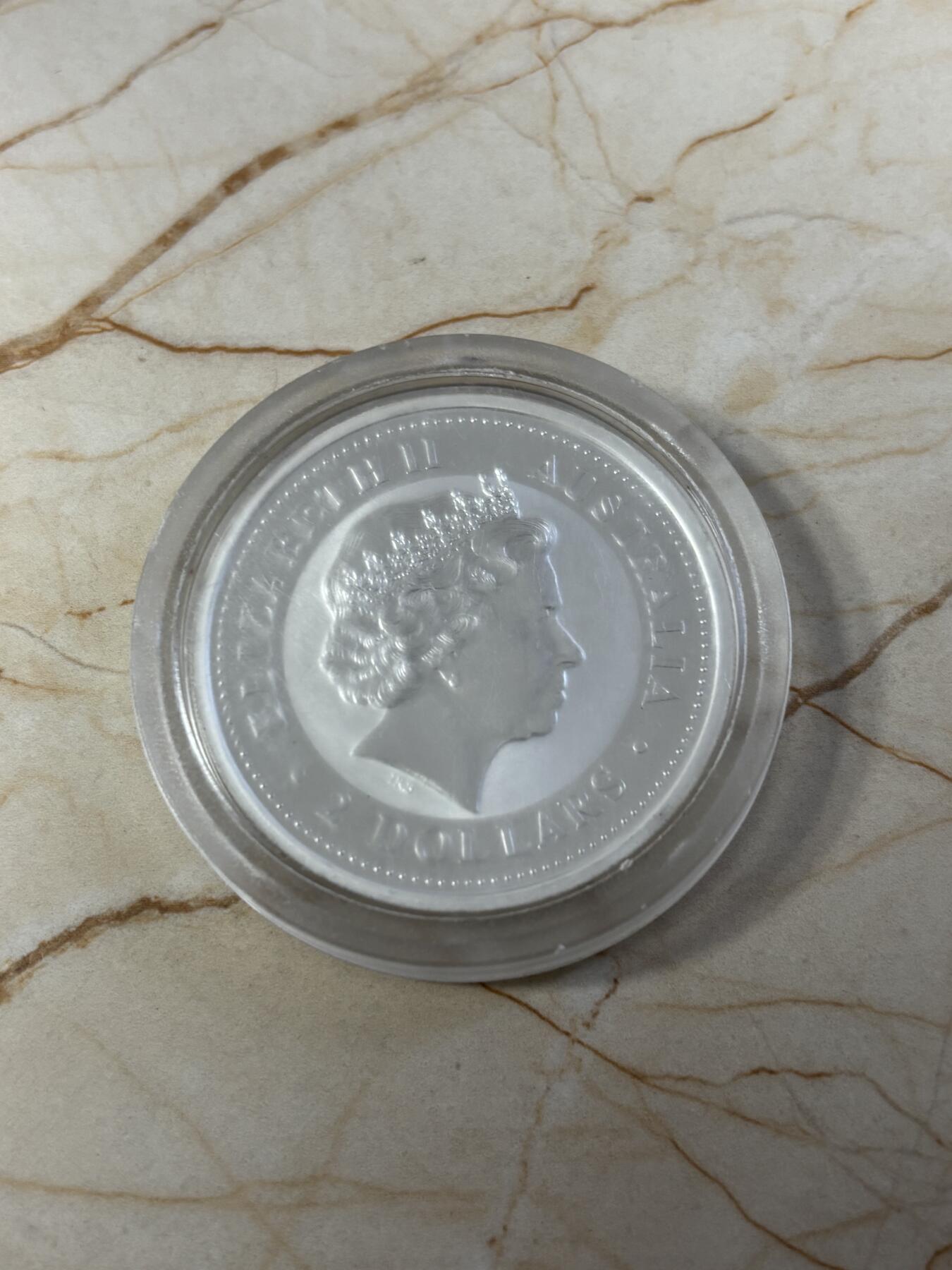 第186期拍卖 澳大利亚2003年十二生肖羊年2盎司999银纪念银币，直径50毫米 材料价格大致1120