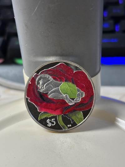 第186期拍卖 - 维尔京2014年婴儿出生宝宝1/2盎司精制纪念彩色银币，925银，15.55克，发行2014枚，边缘有氧化，没有塑料盒，银价260