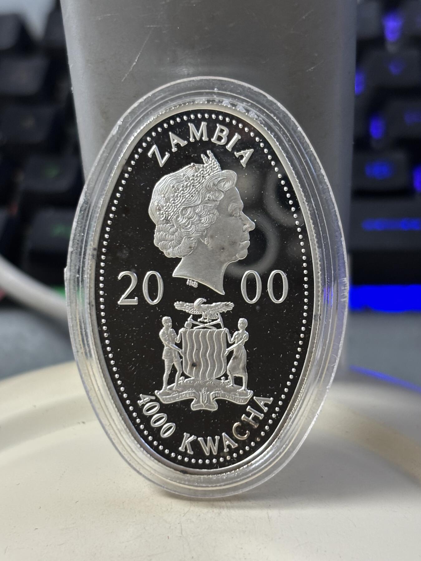 第186期拍卖 赞比亚2000年女王母亲肖像彩色纪念银币3枚套，925银，20克*3，银价999，有瑕疵