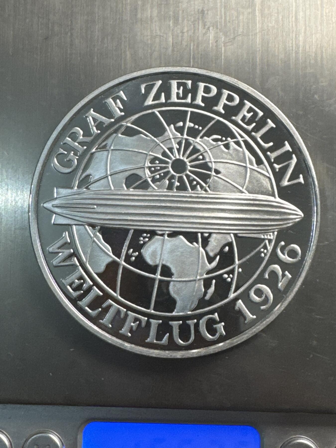 ❤️【币观天下】❤️ 第337期钱币拍卖- 2026.1.2周五晚上6点半场-长期征集拍品 德国魏玛1986年齐柏林飞艇5盎司999纪念银章155.24克