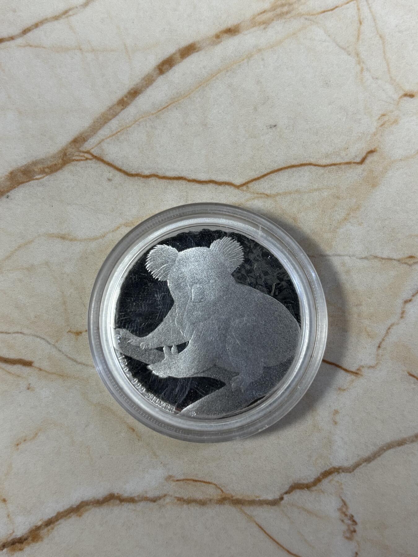 第186期拍卖 澳大利亚2009年世界投资银币考拉3树袋熊1/2盎司银币，999银，，银价280