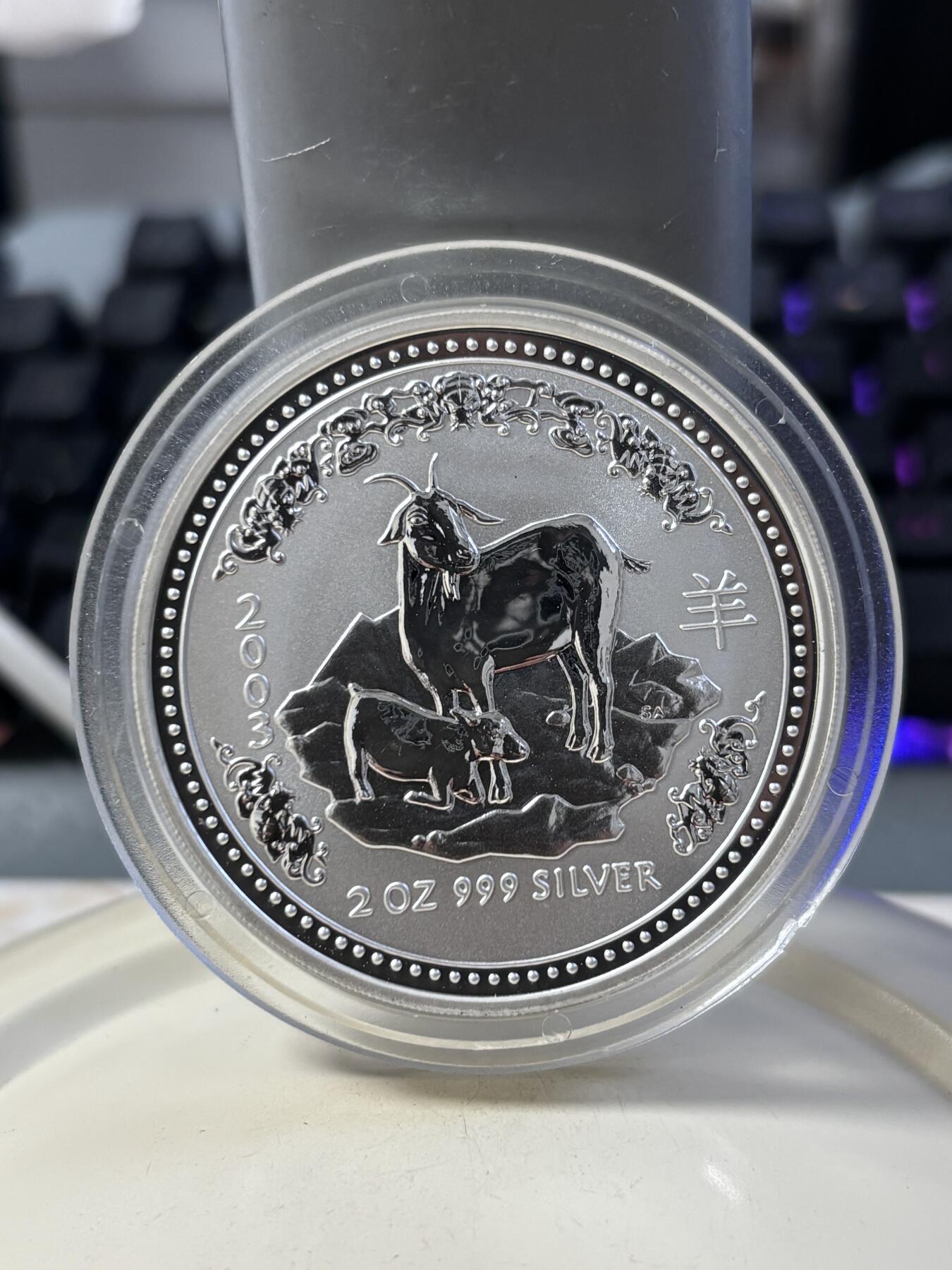 第186期拍卖 澳大利亚2003年十二生肖羊年2盎司999银纪念银币，直径50毫米 材料价格大致1120