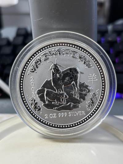 第186期拍卖 - 澳大利亚2003年十二生肖羊年2盎司999银纪念银币，直径50毫米 材料价格大致1120