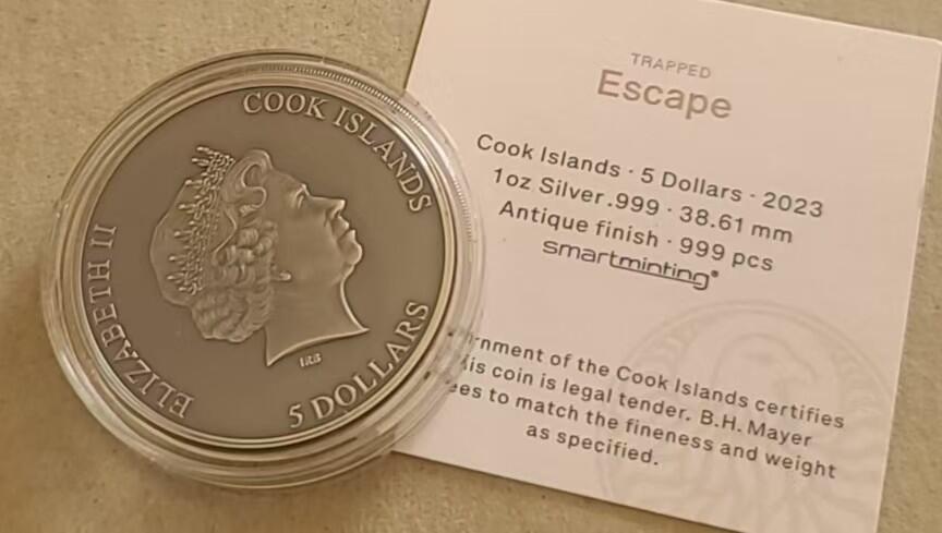 ❤️【币观天下】❤️ 第337期钱币拍卖- 2026.1.2周五晚上6点半场-长期征集拍品 库克2023年逃离困境1盎司仿古银币带证书包装