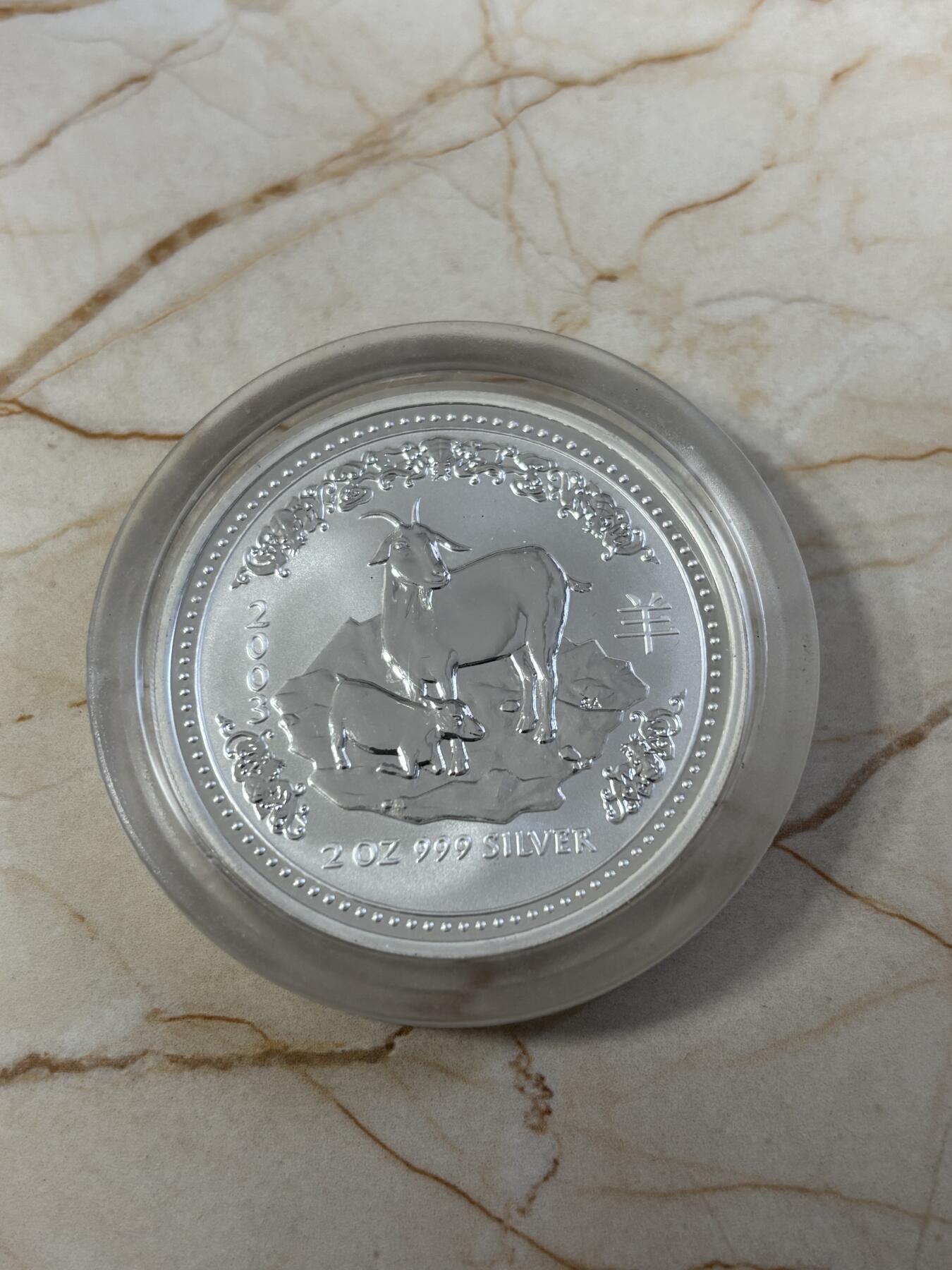 第186期拍卖 澳大利亚2003年十二生肖羊年2盎司999银纪念银币，直径50毫米 材料价格大致1120