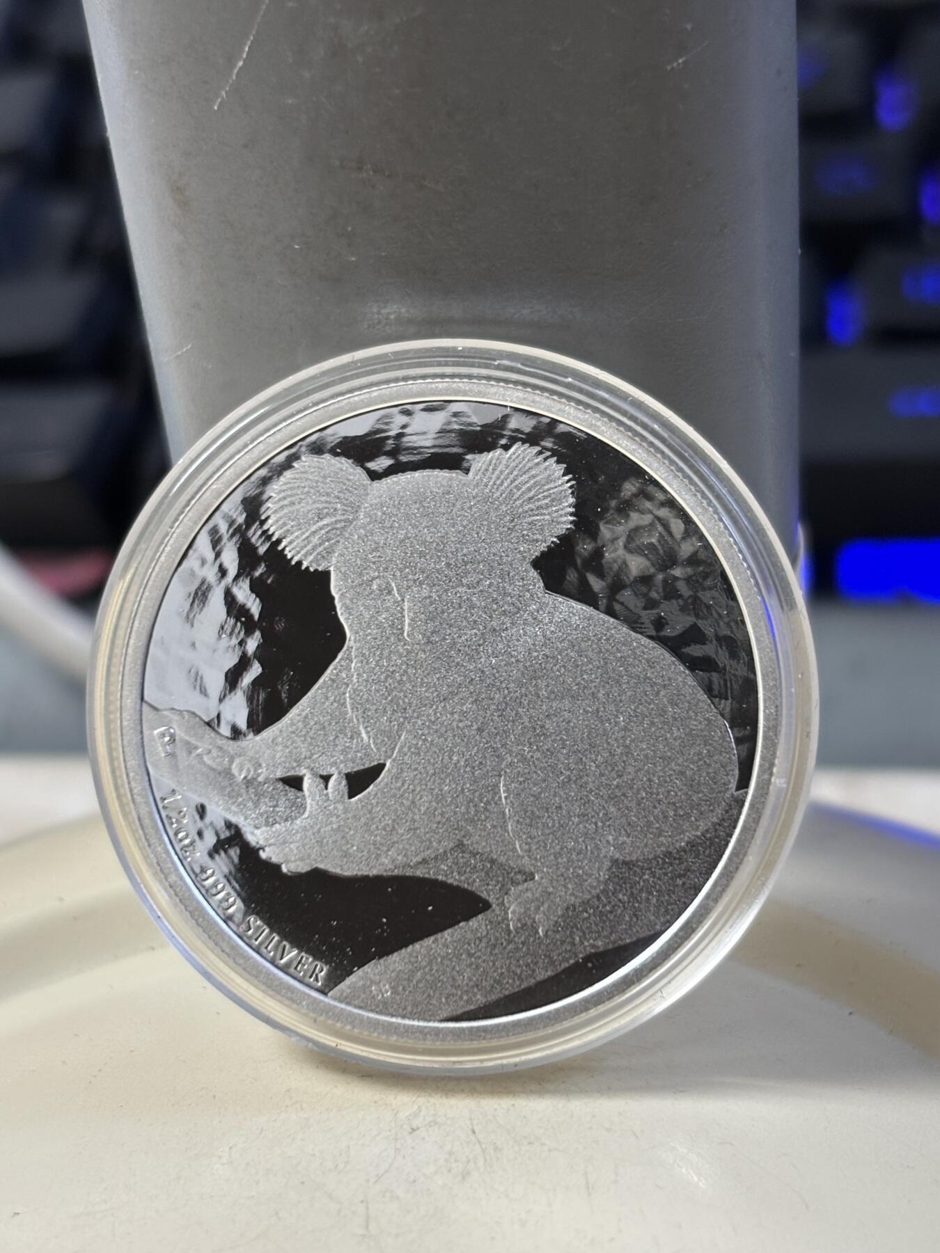 第186期拍卖 澳大利亚2009年世界投资银币考拉3树袋熊1/2盎司银币，999银，，银价280