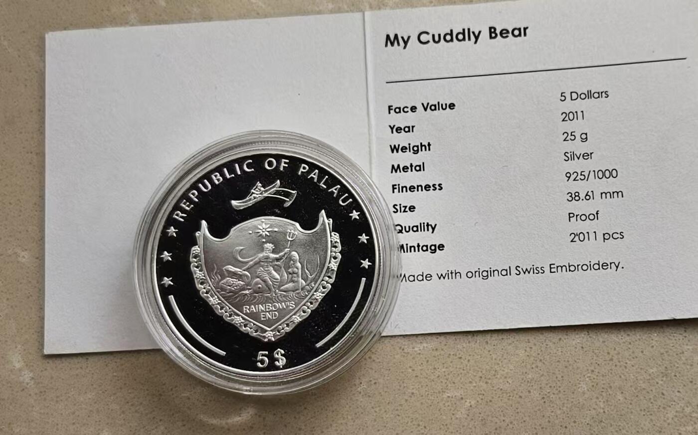 ❤️【币观天下】❤️ 第337期钱币拍卖- 2026.1.2周五晚上6点半场-长期征集拍品 帕劳2011年可爱小熊瑞士刺绣25克银币带证书包装有氧化
