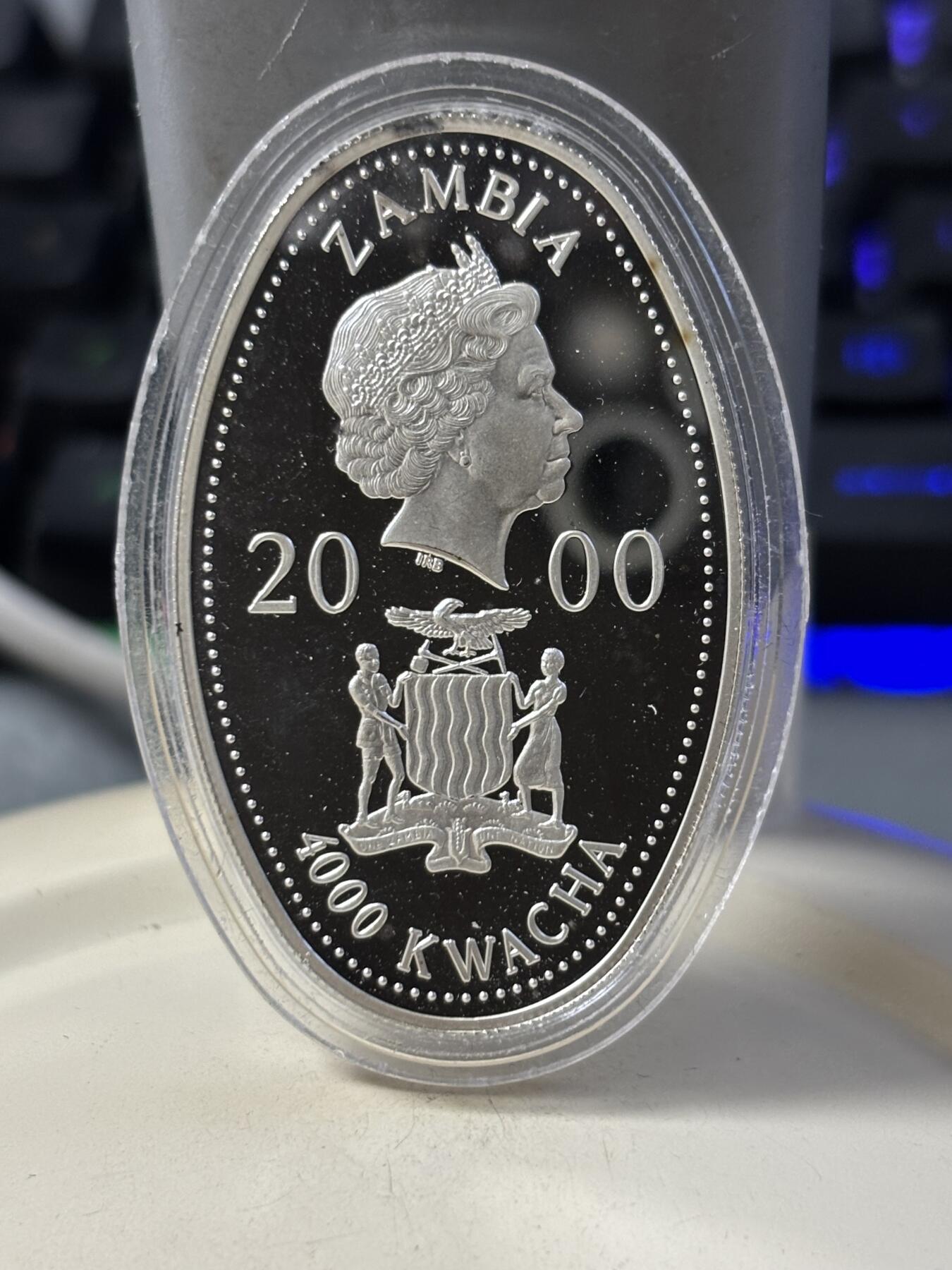 第186期拍卖 赞比亚2000年女王母亲肖像彩色纪念银币3枚套，925银，20克*3，银价999，有瑕疵