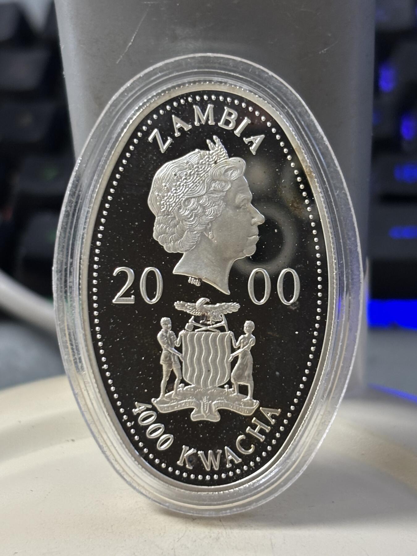 第186期拍卖 赞比亚2000年女王母亲肖像彩色纪念银币3枚套，925银，20克*3，银价999，有瑕疵