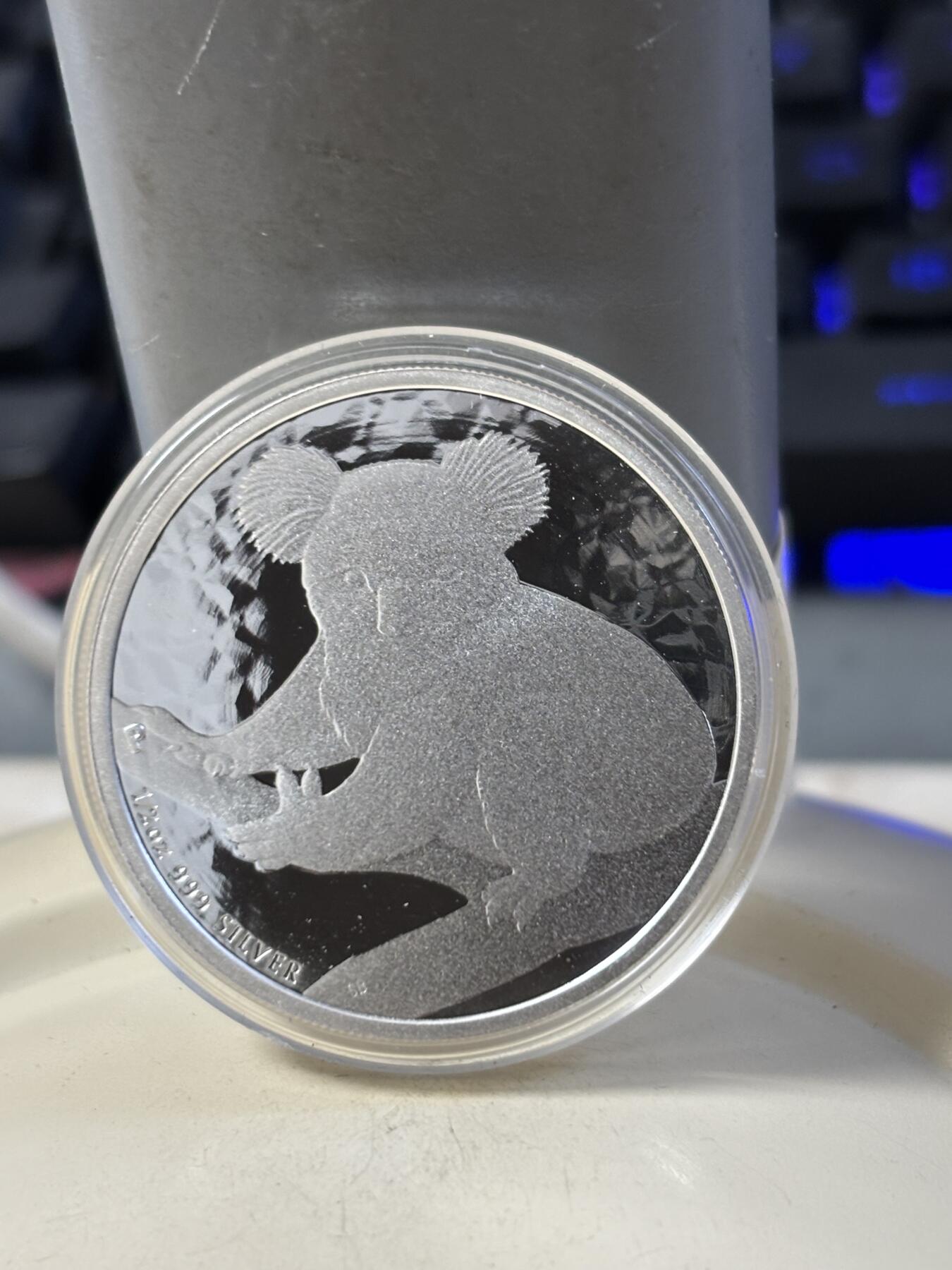 第186期拍卖 澳大利亚2009年世界投资银币考拉3树袋熊1/2盎司银币，999银，，银价280