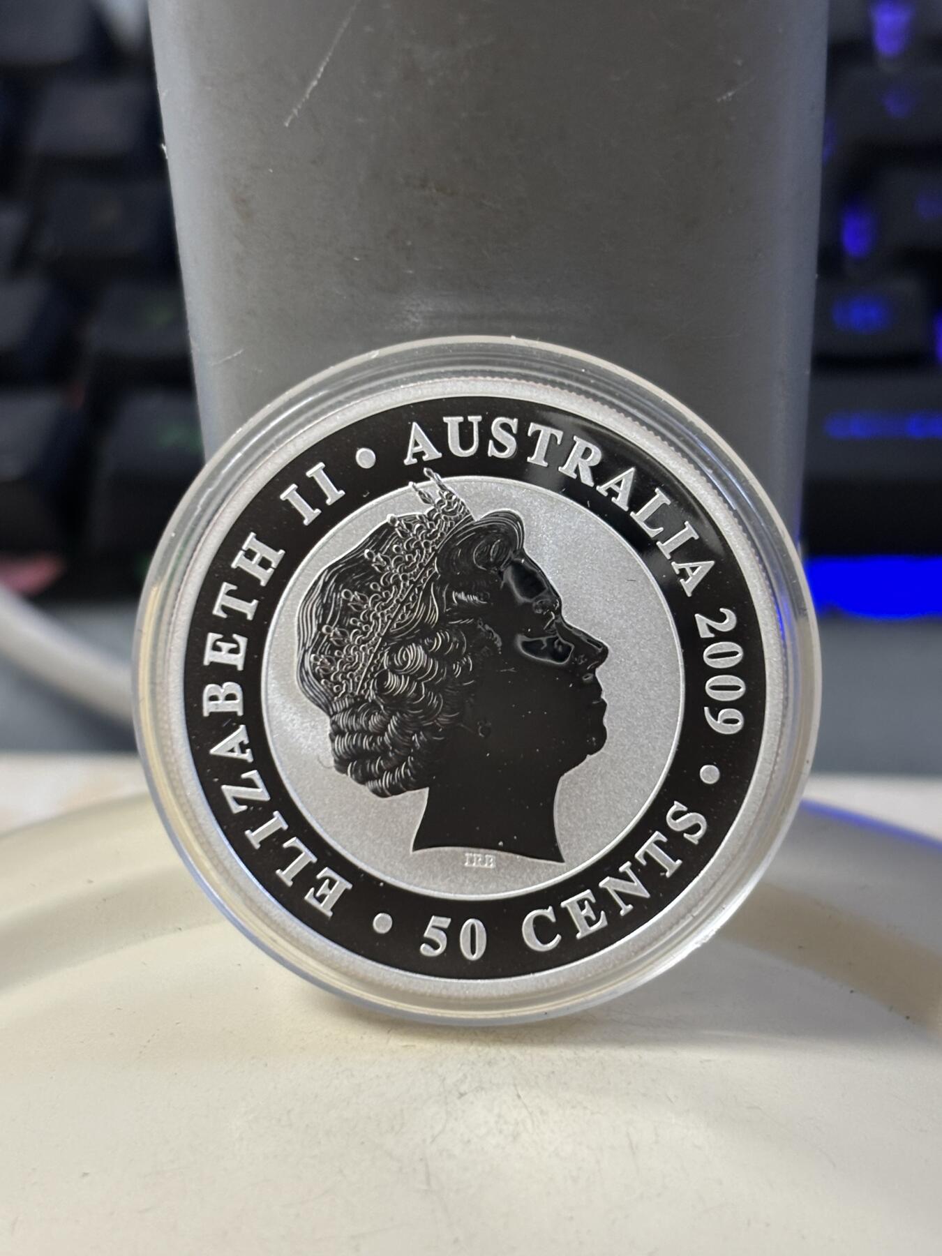 第186期拍卖 澳大利亚2009年世界投资银币考拉3树袋熊1/2盎司银币，999银，，银价280