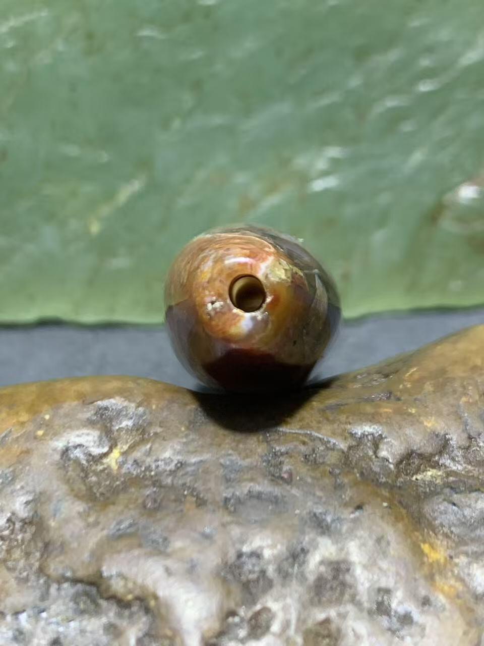 冻料草花纹战国红玛瑙天珠形通货桶珠一个