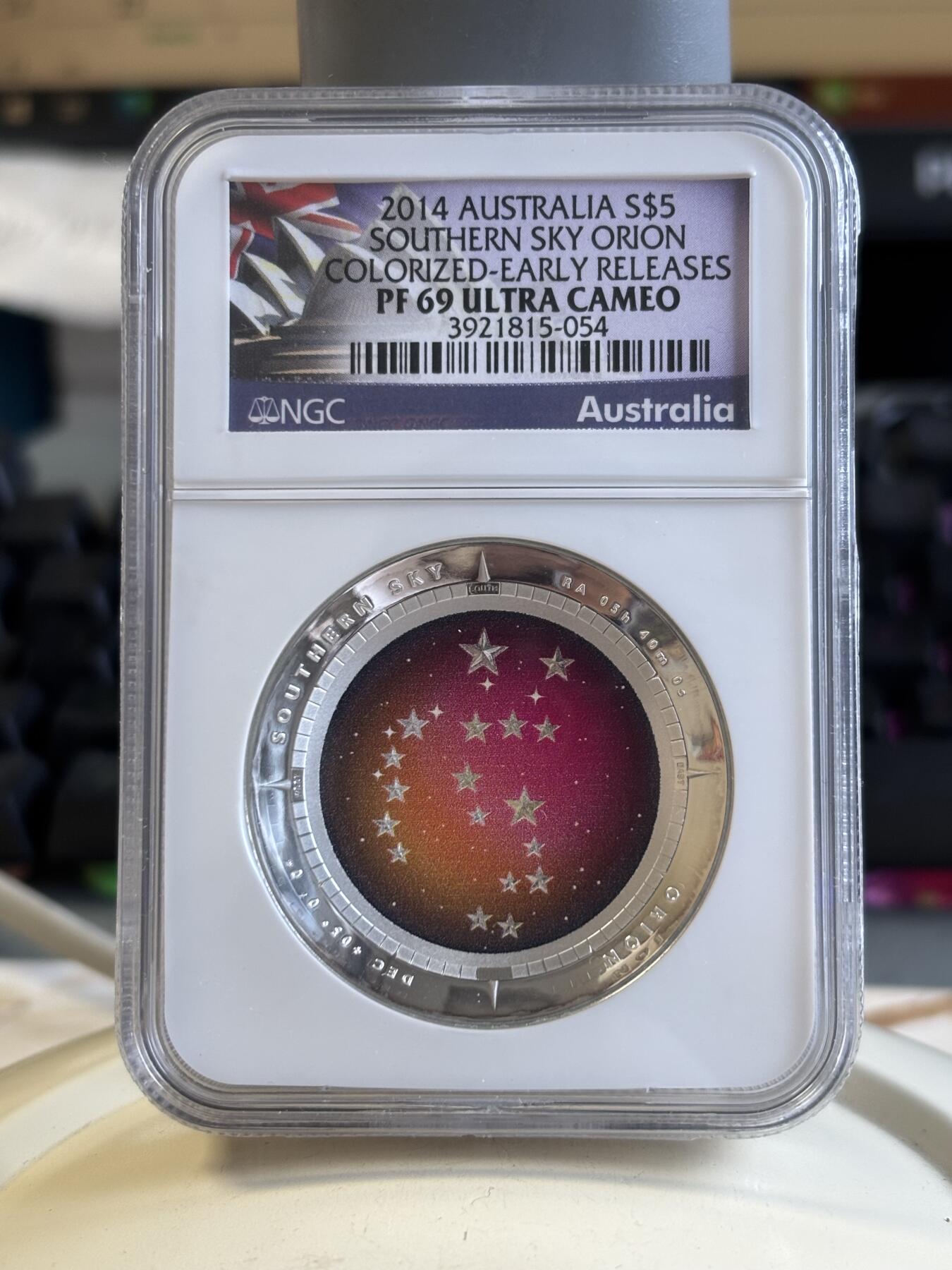 第186期拍卖 澳大利亚2014年南天星空系列3猎户座凹凸纪念1盎司彩色银币NGC-PF69，999银，发行10000枚