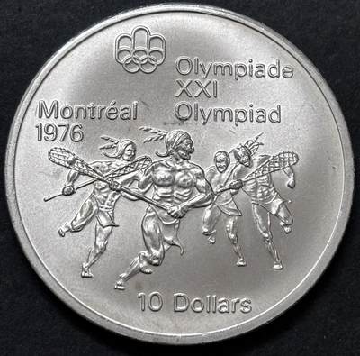 文馨钱币收藏 迎新纳福2026新年第一场（第 287 场）金银老铜币拍卖 - 原光品相 1974 年加拿大蒙特利尔第 21 届夏季奥林匹克运动会长曲棍球系列 10 元纪念大银币，48.6 克 925 高银，边上有一点小磕碰，品相可评级
