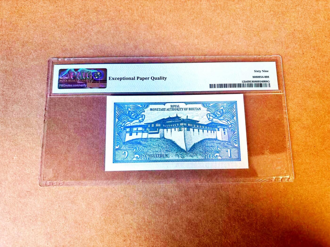 【Blue Auction】世界纸币精拍第771期——18级TOP拍卖/信誉/品质/专业/高效💫 【冠军分】不丹 1990年1努尔特鲁姆 PMG69EPQ 近满分