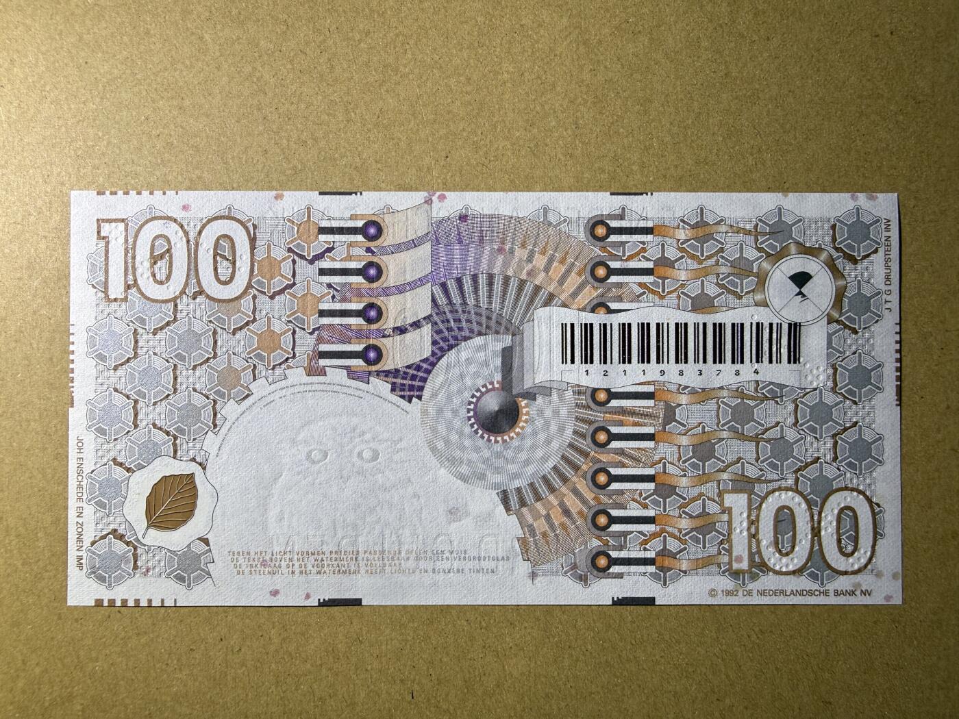《艾美收藏》第227期-1.3周六外币黄金场-马年首拍 荷兰100盾 UNC 1992年 齿轮版 有一处荧光点