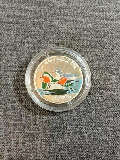 第186期拍卖 - 朝鲜1995年动物鸳鸯7克彩色纪念银币，999银，