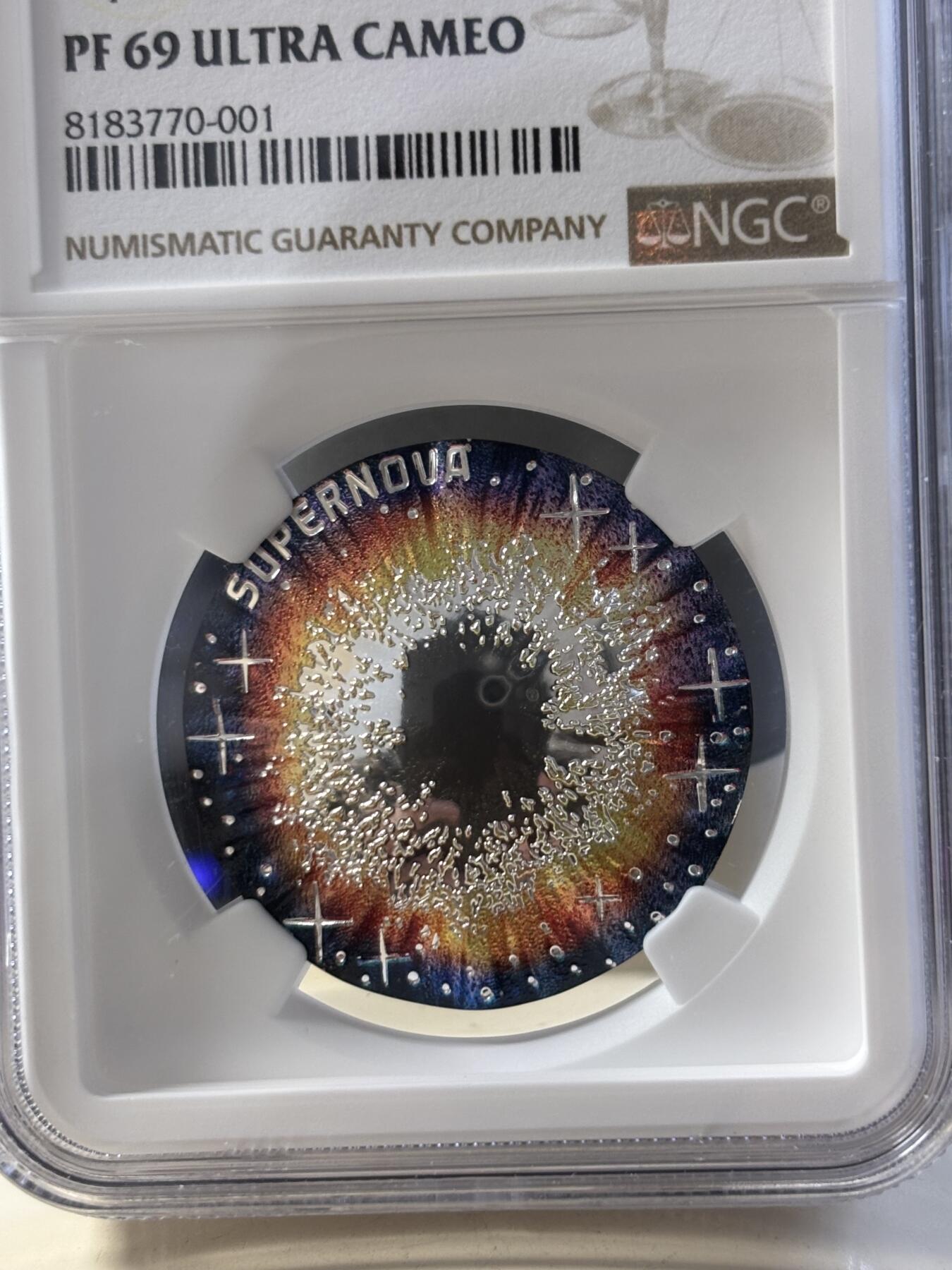 第186期拍卖 获奖币奥地利2024年宇宙之美系列超新星凹凸面22.42克彩色纪念银币NGC-PF69，925银，发行30000枚