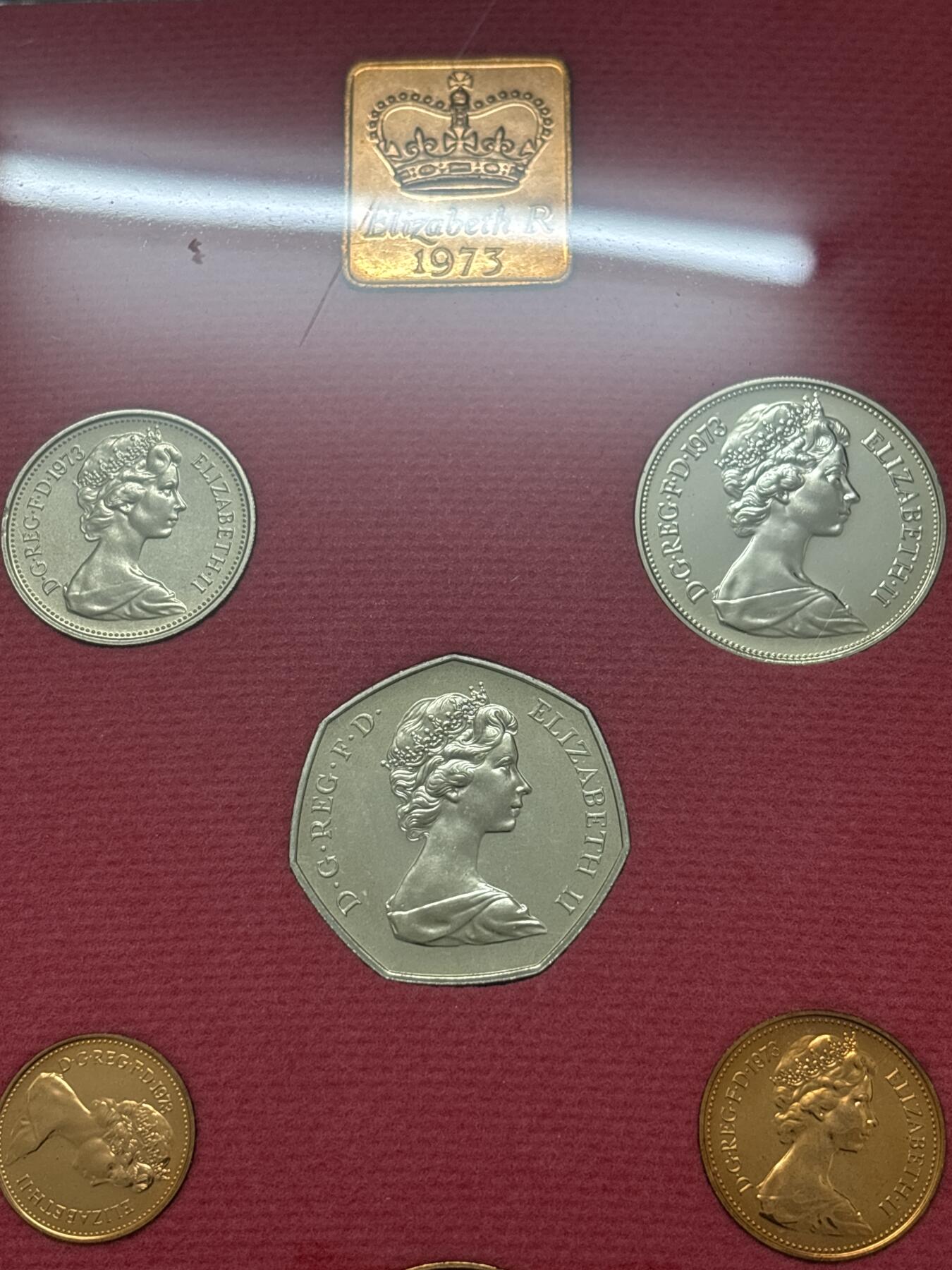 文馨钱币收藏 迎新纳福2026新年第一场（第 287 场）金银老铜币拍卖 原封原盒全新  1973 年英国 1/2 便士--50 便士纪念精制币带铜章一套